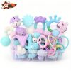 Baby rattle toy set with pastel colors and green storage box – available at sobmall.com