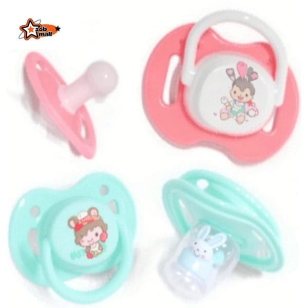 A happy baby using a nontoxic silicone newborn pacifier orthodontic BPA-free