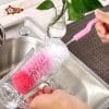 Durable baby bottle cleaning brush with sponge tip for easy bottle washing